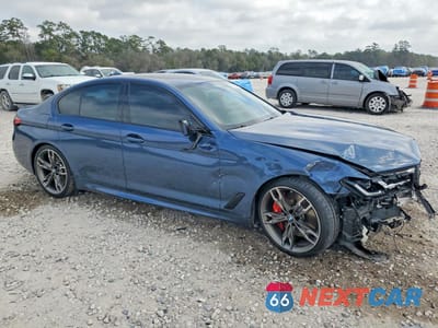 Czwarte zdjęcie samochodu z boku: 2023 BMW M550XI VIN:WBA13BK09PCM32189 - miniatura