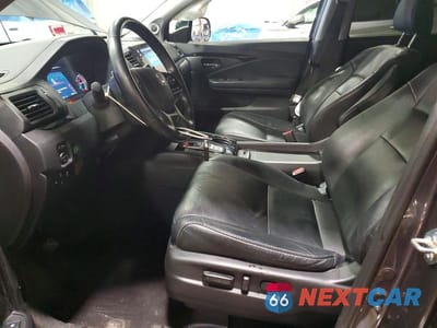 Zdjęcie 7 z 13 samochodu: 2020 HONDA PILOT TOURING VIN:5FNYF6H95LB005126 - miniatura