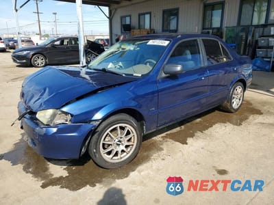 1999 MAZDA PROTEGE DX JM1BJ2220X0104675 - główne zdjęcie licytacji z USA - miniatura