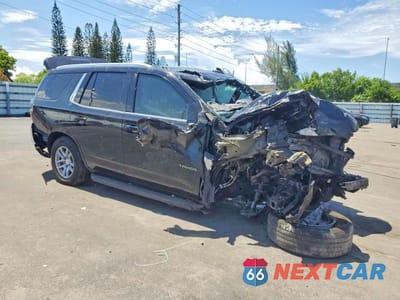 Czwarte zdjęcie samochodu z boku: 2023 CHEVROLET TAHOE C1500 LT VIN:1GNSCNKD5PR235004 - miniatura