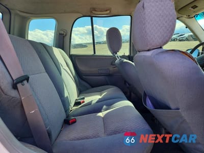 Zdjęcie 11 z 14 samochodu: 1999 CHEVROLET TRACKER VIN:2CNBJ13C2X6921196 - miniatura