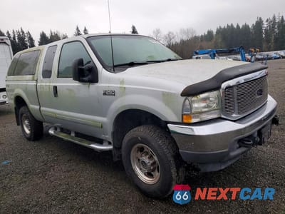 Czwarte zdjęcie samochodu z boku: 2003 FORD F250 SUPER DUTY VIN:1FTNX21L23EB75282 - miniatura