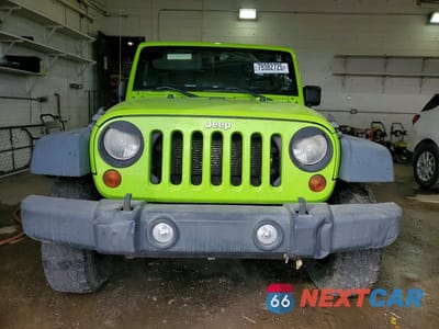 Piąte zdjęcie samochodu w środku: 2013 JEEP WRANGLER UNLIMITED SPORT VIN:1C4BJWDG0DL511776 - miniatura