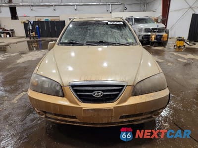Piąte zdjęcie samochodu w środku: 2004 HYUNDAI ELANTRA GLS VIN:KMHDN46D14U745290 - miniatura