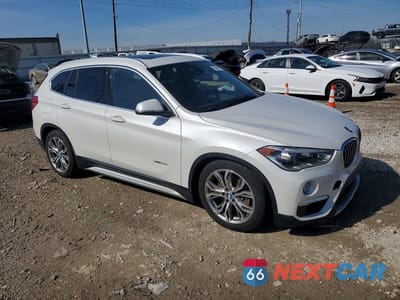 Czwarte zdjęcie samochodu z boku: 2017 BMW X1 XDRIVE28I VIN:WBXHT3C31H5F79084 - miniatura