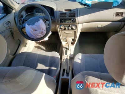 Zdjęcie 8 z 11 samochodu: 1999 TOYOTA COROLLA VE VIN:1NXBR12E3XZ217280 - miniatura