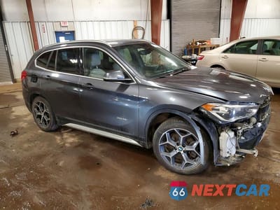 Czwarte zdjęcie samochodu z boku: 2016 BMW X1 XDRIVE28I VIN:WBXHT3Z31G4A48933 - miniatura