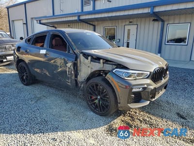 Czwarte zdjęcie samochodu z boku: 2021 BMW X6 M50I VIN:5UXCY8C07M9F89874 - miniatura