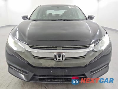 Piąte zdjęcie samochodu w środku: 2017 HONDA CIVIC LX VIN:19XFC2F52HE018986 - miniatura