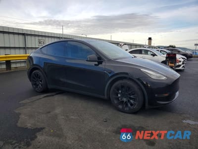 Czwarte zdjęcie samochodu z boku: 2022 TESLA MODEL Y VIN:7SAYGDEE5NF506414 - miniatura