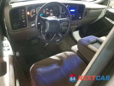 Zdjęcie 8 z 11 samochodu: 1999 GMC SIERRA VIN:1GTEK19T5XE526804 - miniatura