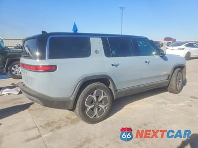 Trzecie zdjęcie samochodu z tyłu: 2024 RIVIAN R1S ADVENTURE VIN:7PDSGABA8RN039136 - miniatura