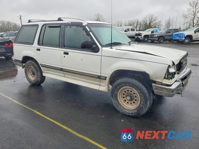 Czwarte zdjęcie samochodu z boku: 1994 FORD EXPLORER VIN:1FMDU34X7RUC50545 - miniatura