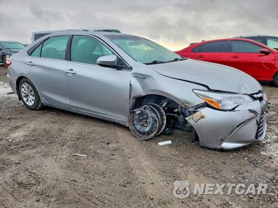 Czwarte zdjęcie samochodu z boku: 2016 TOYOTA CAMRY HYBRID VIN:4T1BD1FK9GU184610 - miniatura