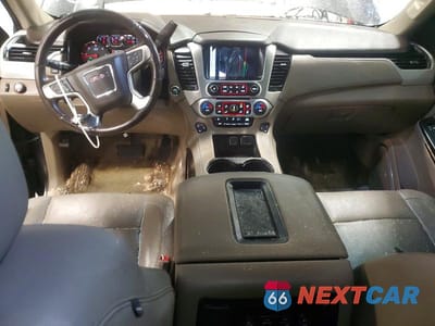 Zdjęcie 8 z 13 samochodu: 2015 GMC YUKON SLT VIN:1GKS1BKC1FR138938 - miniatura