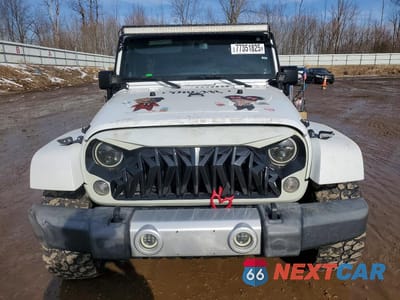 Piąte zdjęcie samochodu w środku: 2014 JEEP WRANGLER UNLIMITED SAHARA VIN:1C4HJWEGXEL262428 - miniatura