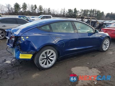 Trzecie zdjęcie samochodu z tyłu: 2022 TESLA MODEL 3 VIN:5YJ3E1EB2NF254414 - miniatura