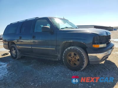 Czwarte zdjęcie samochodu z boku: 2003 CHEVROLET SUBURBAN C1500 VIN:3GNEC16Z23G341223 - miniatura