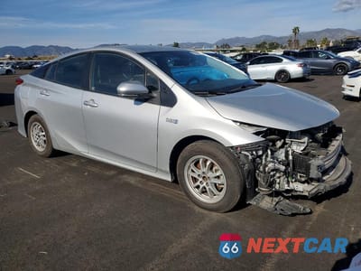 Czwarte zdjęcie samochodu z boku: 2022 TOYOTA PRIUS PRIME LE VIN:JTDKAMFP5N3226946 - miniatura