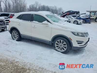 Czwarte zdjęcie samochodu z boku: 2017 LINCOLN MKC SELECT VIN:5LMCJ2D92HUL04300 - miniatura