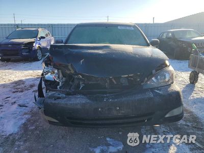 Piąte zdjęcie samochodu w środku: 2002 TOYOTA CAMRY LE VIN:4T1BF30K52U015787 - miniatura