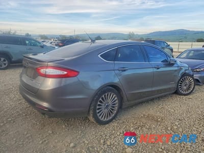 Trzecie zdjęcie samochodu z tyłu: 2014 FORD FUSION TITANIUM HEV VIN:3FA6P0RU5ER379103 - miniatura