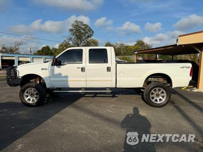 Zdjęcie 11 z 14 samochodu: 2004 FORD F350 SRW SUPER DUTY VIN:1FTSW31P74ED34393 - miniatura