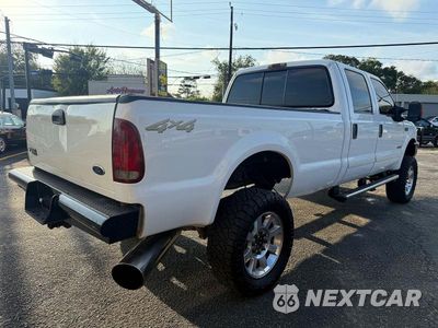 Czwarte zdjęcie samochodu z boku: 2004 FORD F350 SRW SUPER DUTY VIN:1FTSW31P74ED34393 - miniatura
