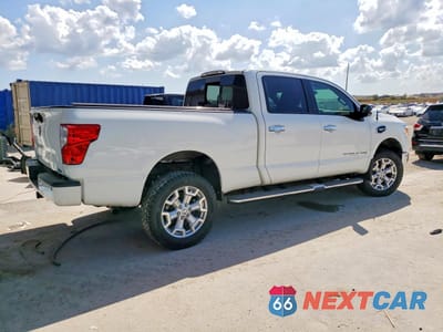 Trzecie zdjęcie samochodu z tyłu: 2017 NISSAN TITAN XD SL VIN:1N6AA1F21HN552134 - miniatura