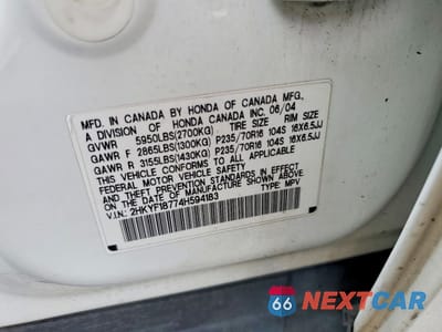 Zdjęcie 13 z 13 samochodu: 2004 HONDA PILOT EXL VIN:2HKYF18774H594183 - miniatura