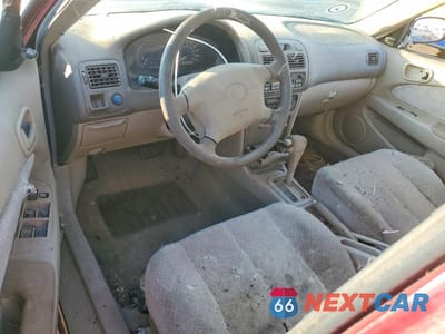 Zdjęcie 8 z 12 samochodu: 1999 TOYOTA COROLLA VE VIN:1NXBR12E6XZ241556 - miniatura