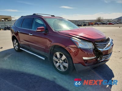 Czwarte zdjęcie samochodu z boku: 2016 CHEVROLET TRAVERSE LTZ VIN:1GNKVJKD3GJ144833 - miniatura