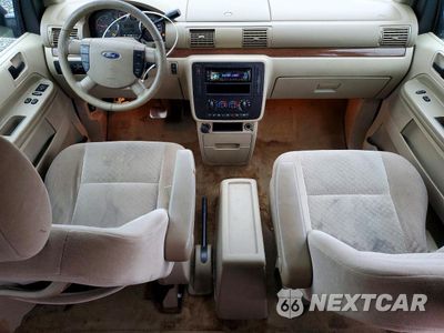 Zdjęcie 8 z 13 samochodu: 2005 FORD FREESTAR SEL VIN:2FMZA52235BA39635 - miniatura