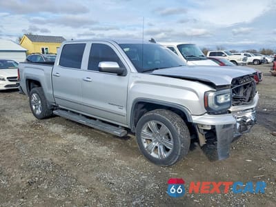 Czwarte zdjęcie samochodu z boku: 2018 GMC SIERRA K1500 SLT VIN:3GTU2NER5JG366436 - miniatura