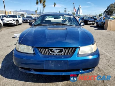 Piąte zdjęcie samochodu w środku: 1999 FORD MUSTANG VIN:1FAFP4043XF108805 - miniatura