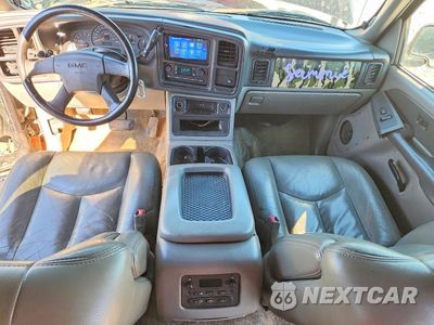 Zdjęcie 8 z 13 samochodu: 2003 GMC YUKON VIN:1GKEC13Z03R179349 - miniatura