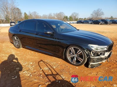 Czwarte zdjęcie samochodu z boku: 2016 BMW 750 XI VIN:WBA7F2C55GG418780 - miniatura