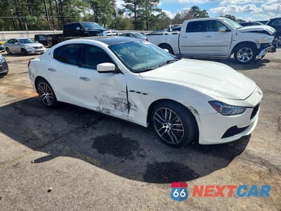 Czwarte zdjęcie samochodu z boku: 2015 MASERATI GHIBLI VIN:ZAM57XSA7F1155238 - miniatura