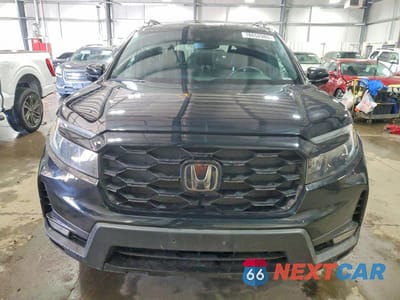 Piąte zdjęcie samochodu w środku: 2022 HONDA PASSPORT ELITE VIN:5FNYF8H07NB014751 - miniatura