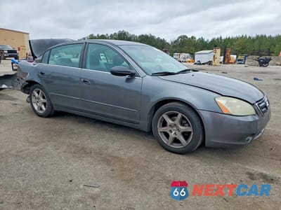 Czwarte zdjęcie samochodu z boku: 2004 NISSAN ALTIMA 3.5 SE VIN:1N4BL11EX4C142883 - miniatura