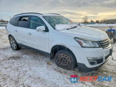 Czwarte zdjęcie samochodu z boku: 2016 CHEVROLET TRAVERSE LT VIN:1GNKRGKD6GJ119819 - miniatura