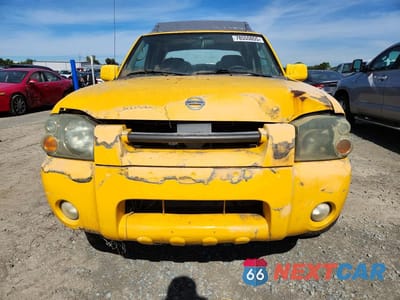 Piąte zdjęcie samochodu w środku: 2004 NISS FRONTIER CREW CAB XE V6 VIN:1N6ED27T74C457654 - miniatura