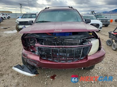 Piąte zdjęcie samochodu w środku: 2001 JEEP GRAND CHEROKEE LIMITED VIN:1J4GW58NX1C739980 - miniatura