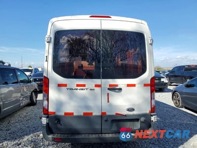 Zdjęcie 6 z 12 samochodu: 2016 FORD TRANSIT 150 DELIVERY VAN VIN:1FTYE2CM5GKB28571 - miniatura