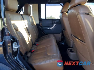 Zdjęcie 10 z 12 samochodu: 2013 JEEP WRANGLER UNLIMITED SAHARA VIN:1C4HJWEG7DL534853 - miniatura