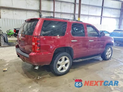 Trzecie zdjęcie samochodu z tyłu: 2010 CHEVROLET TAHOE K1500 LT VIN:1GNUKBE04AR114118 - miniatura