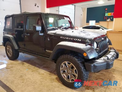 Czwarte zdjęcie samochodu z boku: 2014 JEEP WRANGLER UNLIMITED RUBICON VIN:1C4BJWFG0EL239759 - miniatura