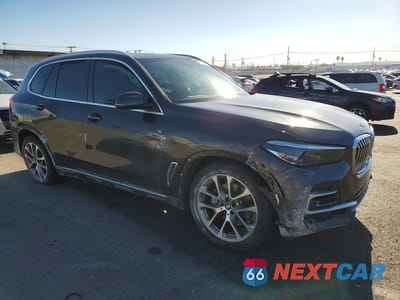 Czwarte zdjęcie samochodu z boku: 2022 BMW X5 SDRIVE 40I VIN:5UXCR4C07N9L38258 - miniatura