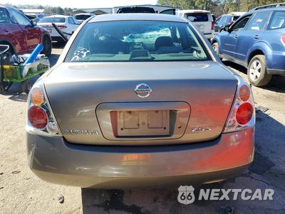 Zdjęcie 11 z 24 samochodu: 2004 NISSAN ALTIMA BASE VIN:1N4AL11D64C198872 - miniatura