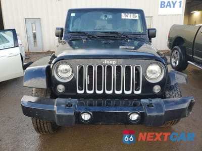 Piąte zdjęcie samochodu w środku: 2017 JEEP WRANGLER UNLIMITED SAHARA VIN:1C4BJWEG5HL723013 - miniatura